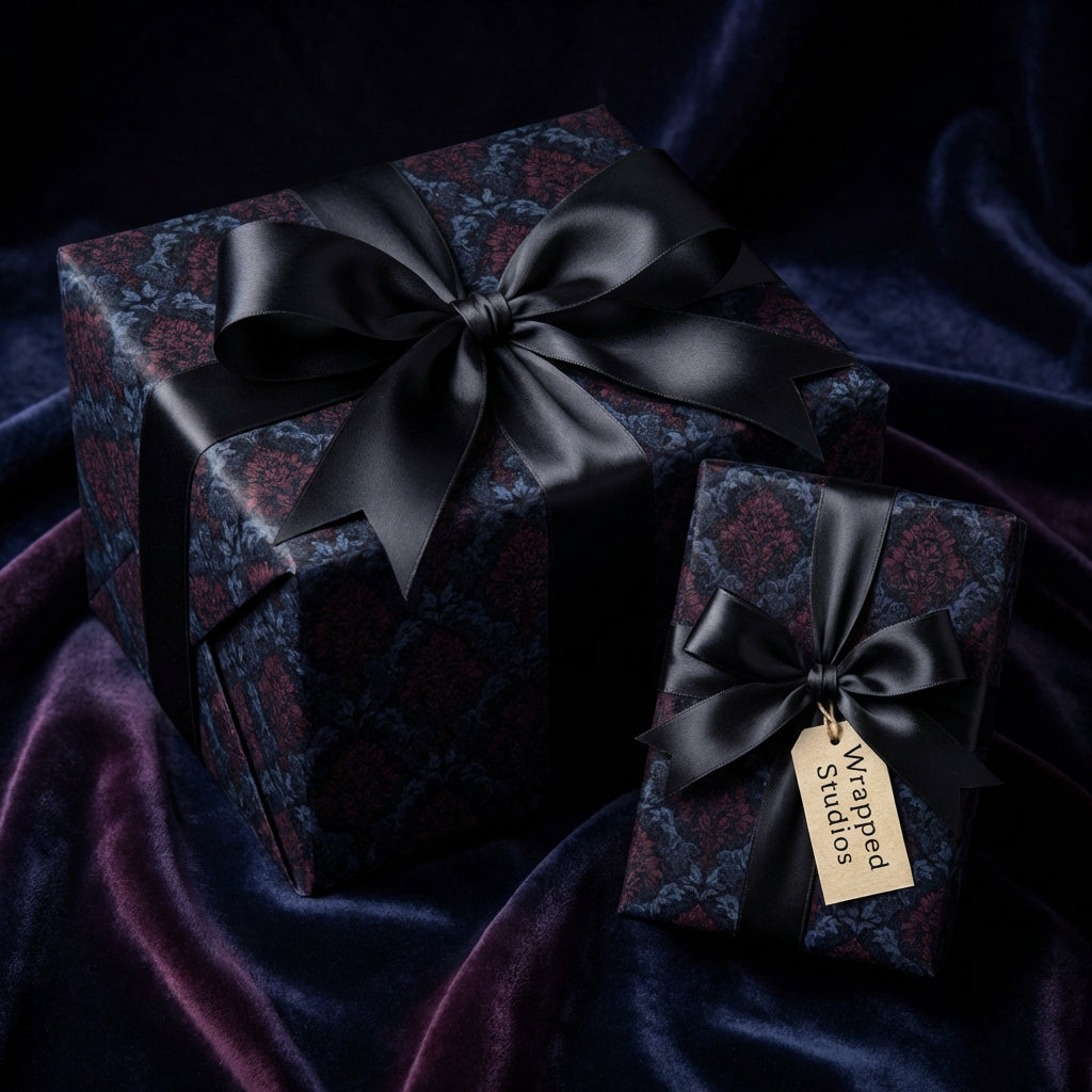 Elegant gifts wrapped in dark floral wrapping paper with black satin ribbon.