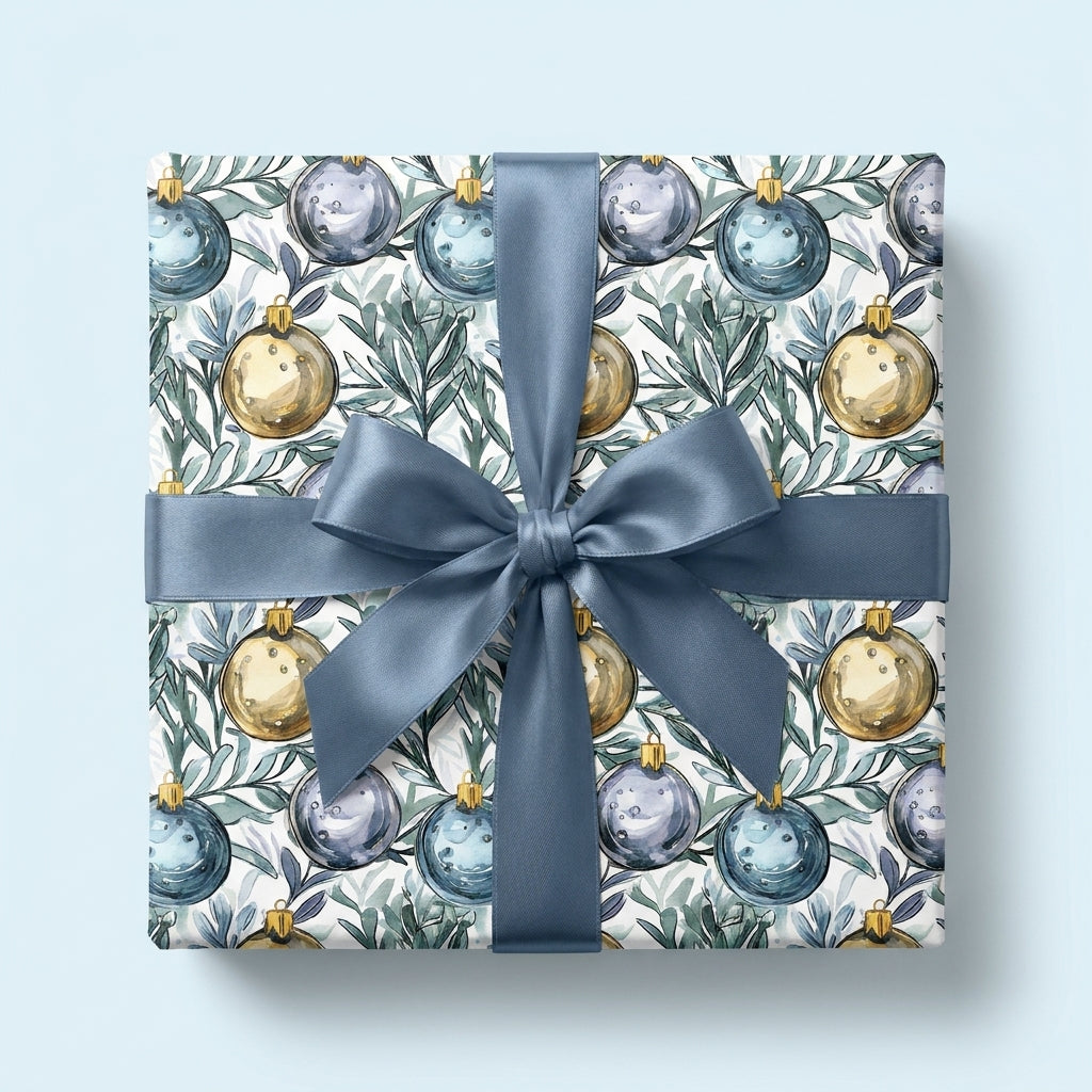 Luxury Christmas wrapping paper with watercolor ornaments and a dusty blue satin bow by Wrapped Studios.