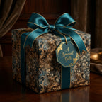 Elegant gift wrapped in gold floral wrapping paper with teal ribbon and a "Special Gift" tag.