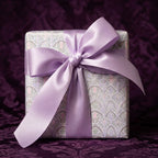 Luxury pastel gothic wrapping paper with a lavender satin bow by Wrapped Studios.