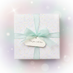 Pastel dot wrapping paper with mint ribbon and "For you, with love" tag, perfect for baby shower or birthday gift.