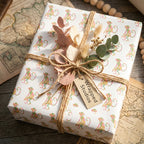 Cute monkey wrapping paper on a gift box with rustic twine and dried flowers by Wrapped Studios.
