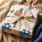 Patriotic floral wrapping paper with a cream ribbon and freedom tag by Wrapped Studios.