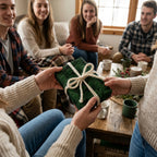 Green pine holiday wrapping paper with a twine bow on a gift exchanged by friends. Wrapped Studios.