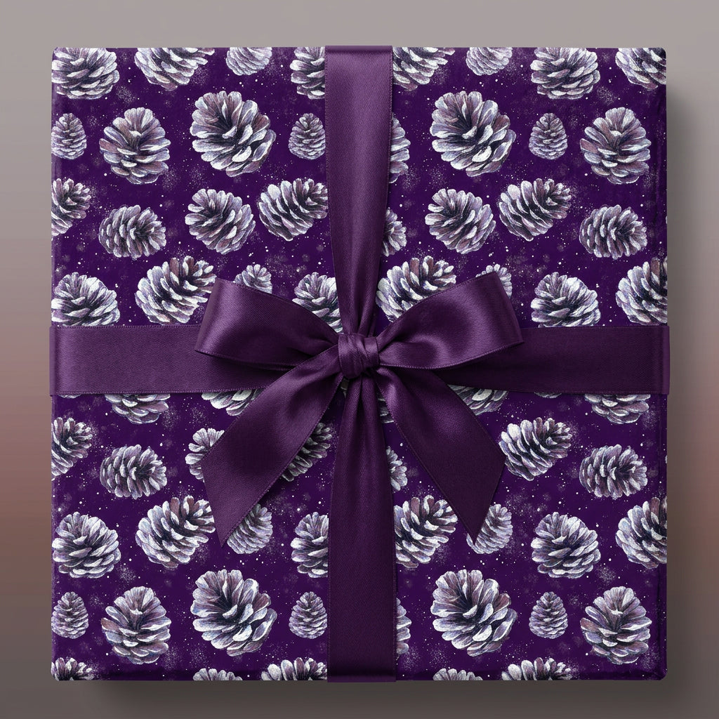 Square gift in purple pinecone Christmas wrapping paper with matching satin ribbon bow.