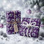 Wrapped Studios purple Christmas gift wrap with pinecone pattern and twine bow.