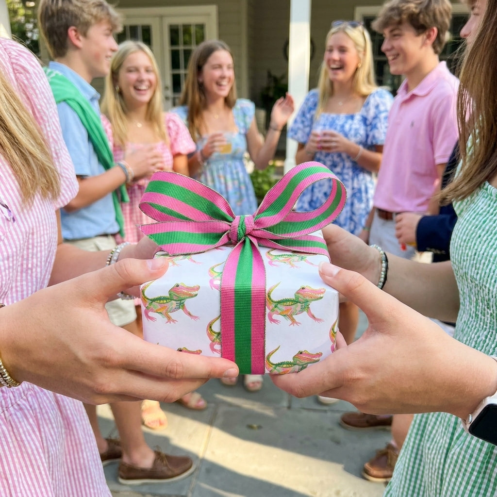 Preppy alligator wrapping paper with pink and green ribbon by Wrapped Studios.