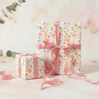 Floral wrapping paper on gifts tied with pink ribbon from Wrapped Studios.