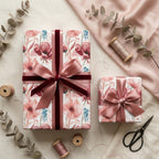 Elegant dusty rose floral wrapping paper by Wrapped Studios with pink satin and velvet bows.