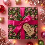 Nutcracker Christmas gift wrap with pink ribbon.