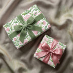 Luxury botanical floral wrapping paper with sage velvet and pink ribbons by Wrapped Studios.