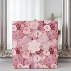Elegant gift wrapped in pink floral wrapping paper with ribbon and "Thinking of You" tag.