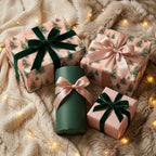 Elegant pink Christmas wrapping paper with pine tree pattern and velvet bows by Wrapped Studios.