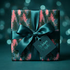 Luxury teal and pink pine tree Christmas gift wrap with a satin bow and tag by Wrapped Studios.