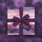 Elegant watercolor wrapping paper in shades of purple with ribbon bow and gold glitter accents.