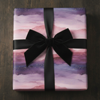 Square gift wrapped in purple watercolor paper with black velvet ribbon.