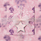 Square gift wrapped in pink floral wrapping paper with sheer ribbon and "With Love" star tag.