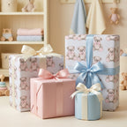 Teddy bear baby shower wrapping paper on pastel gift boxes with satin bows by Wrapped Studios.