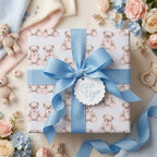 Teddy bear wrapping paper with blue ribbon for baby shower gifts by Wrapped Studios.