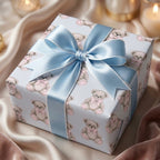 Cute teddy bear baby shower wrapping paper with a blue satin bow by Wrapped Studios.