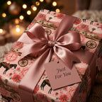 Dusty pink western wrapping paper with horses, wildflowers, and a satin bow by Wrapped Studios.