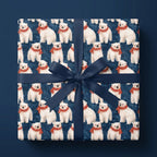 Polar bear Christmas wrapping paper with red scarves and a navy bow by Wrapped Studios.