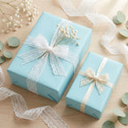 Light blue wrapping paper with lace ribbon and bows for elegant gift wrap, baby shower or birthday presents.