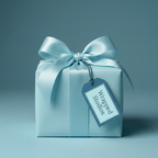 Solid light blue gift wrap on square present with satin ribbon bow and tag.