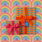 Bright rainbow patterned gift wrap with velvet ribbons on present boxes, ideal birthday wrapping paper.