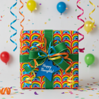 Square gift wrapped in rainbow pattern birthday wrapping paper with green ribbon and "Happy Thoughts" tag.