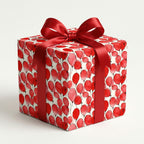 Red balloon birthday wrapping paper with satin ribbon bow. Wrapped Studios.