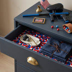 Patriotic red white and blue camo wrapping paper used as a drawer liner in a dresser by Wrapped Studios.