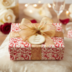 Romantic heart pattern wrapping paper with gold ribbon and "To A Special Couple" tag, perfect for luxury wedding or anniversary gifts.