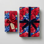 Two gifts wrapped in Wrapped Studios floral wrapping paper with velvet ribbons.