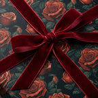 Floral wrapping paper featuring red roses and a velvet bow. Wrapped Studios luxury gift wrap.