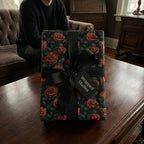 Elegant rose floral wrapping paper with black ribbon from Wrapped Studios.