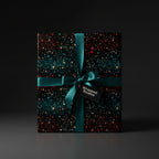 Elegant gift wrapped in black constellation wrapping paper with teal ribbon.