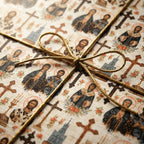 Orthodox Christian wrapping paper with religious icons and a gold cord bow by Wrapped Studios.