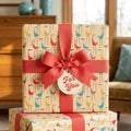 Mid-century modern bird wrapping paper with a coral bow and "For You" tag by Wrapped Studios.