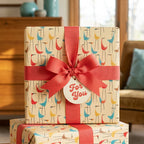 Mid-century modern bird wrapping paper with a coral bow and "For You" tag by Wrapped Studios.