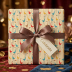 Retro mid-century modern bird wrapping paper with brown ribbon and Celebrate tag by Wrapped Studios.