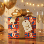 Red 40th birthday wrapping paper with a metallic gold bow and gift tag by Wrapped Studios.