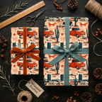 Western wrapping paper with retro red trucks and cacti, tied with velvet ribbons by Wrapped Studios.