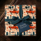 Rustic cowboy wrapping paper with red trucks and cows, tied with a blue bow by Wrapped Studios.
