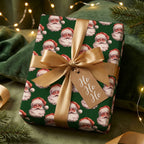Vintage Santa Christmas wrapping paper with a luxury gold ribbon and tag by Wrapped Studios.