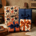 Vintage music wrapping paper with retro guitars and satin bows on gift boxes by Wrapped Studios.