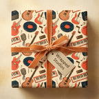 Retro music wrapping paper with guitars and a velvet bow on a gift box by Wrapped Studios.
