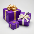 Elegant purple gift boxes wrapped with gold and cream ribbon, perfect for birthdays or special occasions.