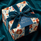 Vintage floral wrapping paper with luxury teal velvet ribbon and gift tag, by Wrapped Studios.