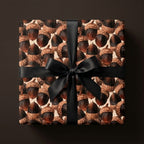 Rustic acorn fall wrapping paper with a black satin bow on a gift box. Autumn gift wrap by Wrapped Studios.